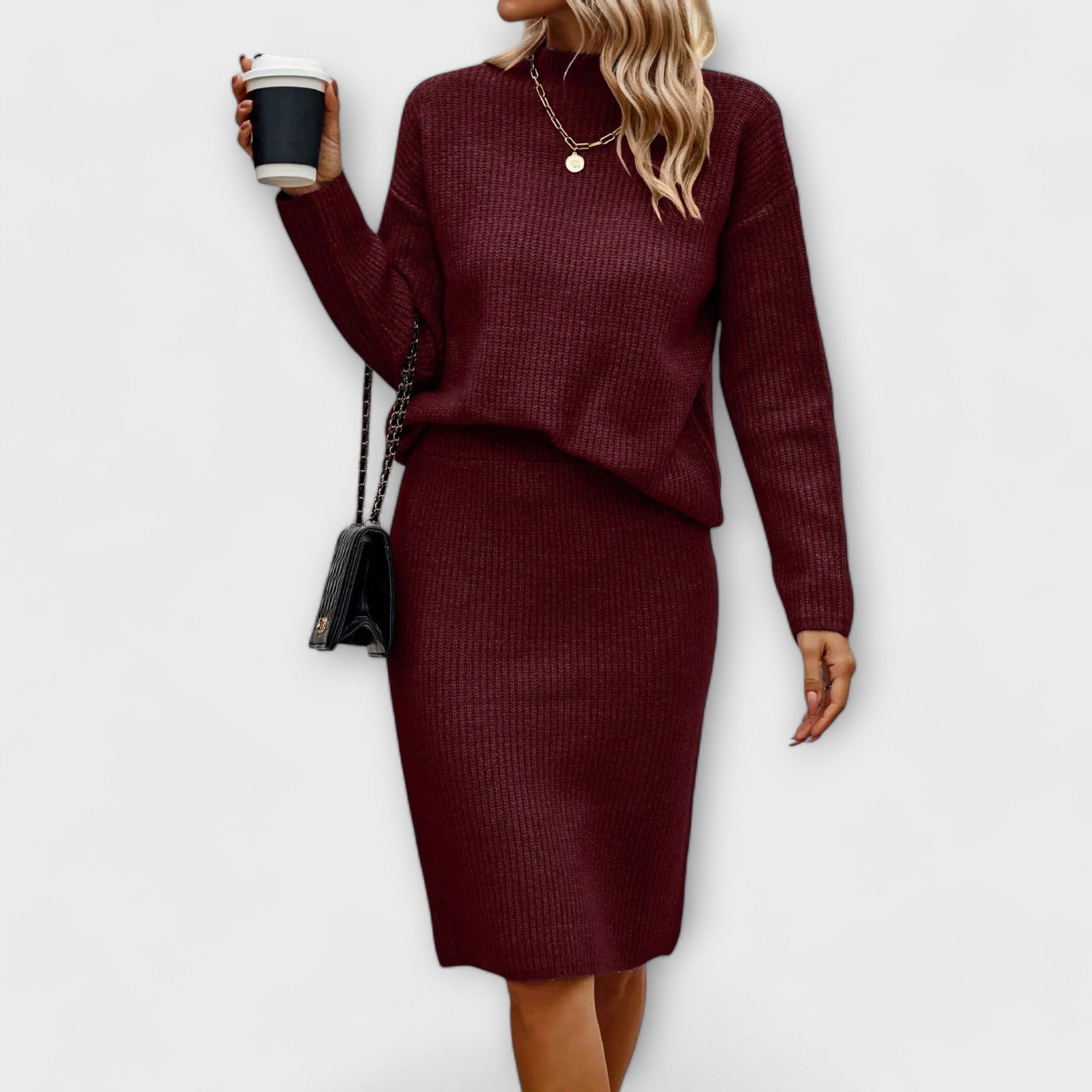 Complete with sweater and two-piece skirt
