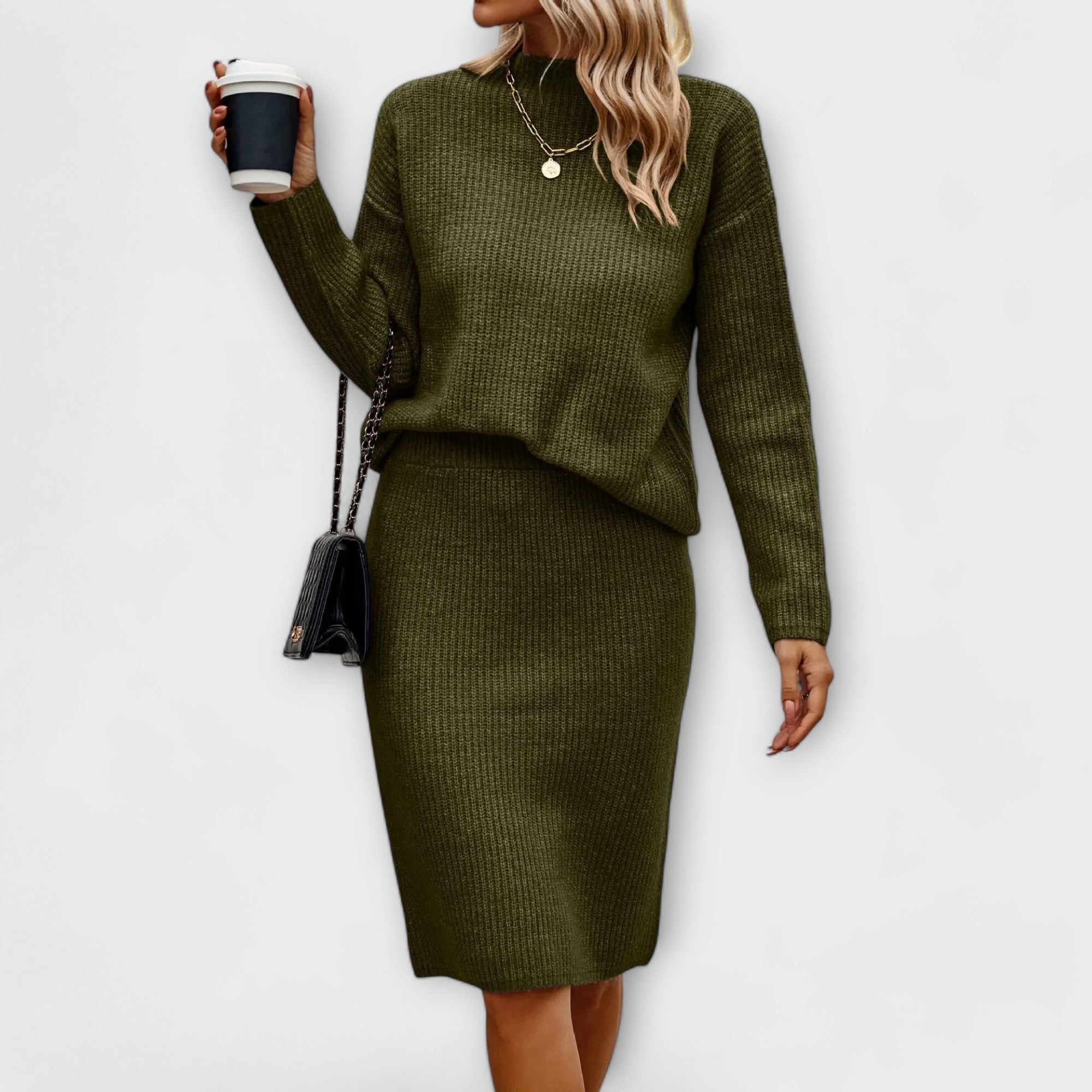 Complete with sweater and two-piece skirt